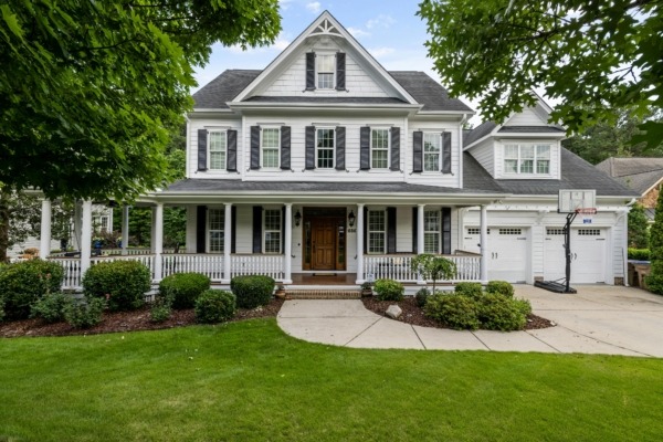 Suburban home with wood columns.